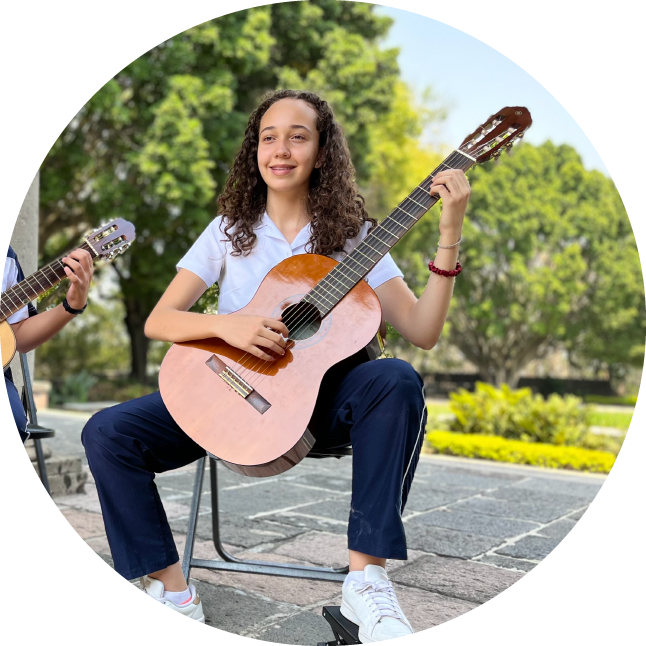 Foto de un alumno con Guitarra